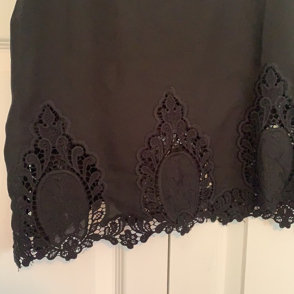 Black tank top. - Picture 2 of 3